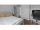 Cozy bedroom featuring modern decor, including an accent mirror and comfortable furnishings at 727 Martin Luther King Jr Blvd Blvd, Raleigh, NC 27601