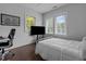 Modern bedroom featuring hardwood floors, large windows with a lot of natural light at 727 Martin Luther King Jr Blvd Blvd, Raleigh, NC 27601