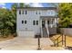 Charming two-story home with inviting front porch, garage, and manicured lawn at 727 Martin Luther King Jr Blvd Blvd, Raleigh, NC 27601