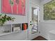 Hallway featuring a decorative bookshelf and an open view to an outdoor patio at 727 Martin Luther King Jr Blvd Blvd, Raleigh, NC 27601