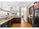 Well-appointed kitchen with granite countertops, stainless steel appliances, and an open layout at 7945 Parker Mill Trail, Fuquay Varina, NC 27526