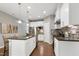 Kitchen featuring stainless steel appliances, white cabinets, and granite counters at 1009 Santiago St, Durham, NC 27703