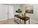 Office with decor, a globe, natural light, and a faux tree, near double doors at 1009 Santiago St, Durham, NC 27703