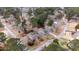House nestled in a quiet neighborhood with mature trees and ample space at 101 Monterey Ln, Durham, NC 27713