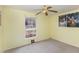 Bright bedroom with neutral walls, carpet flooring, and a window view at 101 Monterey Ln, Durham, NC 27713