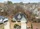 Aerial view of a house showcasing its size and backyard at 102 Kensbury Cir, Cary, NC 27513