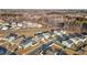 Aerial view of a residential neighborhood with houses and trees at 105 Kcf Dr, Elon, NC 27244