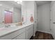 Double vanity bathroom with modern fixtures at 105 Kcf Dr, Elon, NC 27244