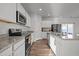 Modern kitchen with white cabinets and granite countertops at 105 Kcf Dr, Elon, NC 27244