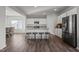Kitchen with white cabinets, granite countertops, and stainless steel appliances at 105 Kcf Dr, Elon, NC 27244