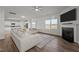 Open living room with a view into the kitchen at 105 Kcf Dr, Elon, NC 27244