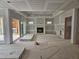 Future living room shows new drywall and recessed ceiling above a fireplace at 109 Evander Way, Pittsboro, NC 27312