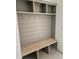 A well designed mudroom offers both open storage and hooks at 109 Evander Way, Pittsboro, NC 27312