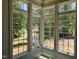 Lots of large windows create bright spaces with great views at 109 Evander Way, Pittsboro, NC 27312