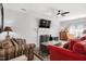 Living room with fireplace and plenty of natural light at 117 Cricketgrass Dr, Cary, NC 27513