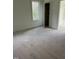 Bedroom featuring a window and closet, offering a bright and open feel at 129 Windel Dr, Raleigh, NC 27609