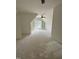 Large bonus room with built-in shelving, ceiling fan, and lots of natural light at 129 Windel Dr, Raleigh, NC 27609