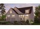 Charming two-story home with a well-maintained lawn, a two car garage, and beautiful curb appeal at 129 Windel Dr, Raleigh, NC 27609