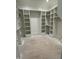 Spacious walk-in closet with custom built-in shelving and ample storage space at 129 Windel Dr, Raleigh, NC 27609