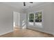 Bright bedroom with hardwood floors and large windows at 1300 Broad St # A, Durham, NC 27705