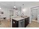 Kitchen with granite counters, stainless steel appliances and hardwood floors at 1300 Broad St # A, Durham, NC 27705