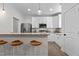 Charming kitchen featuring stainless steel appliances, granite counters and a breakfast bar with stools at 1300 Broad St # A, Durham, NC 27705