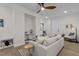 Bright living area with custom built-ins, natural light, and a view to the kitchen at 1300 Broad St # A, Durham, NC 27705