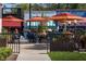 Pleasant outdoor dining area with colorful umbrellas for a relaxing atmosphere at a local cafe at 1300 Broad St # A, Durham, NC 27705