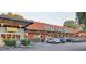 Exterior shot of Whole Foods Market, showcasing its brick facade and convenient parking at 1300 Broad St # A, Durham, NC 27705