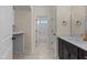 Bathroom with vanity, toilet, shower, and laundry area at 1300 Broad St # C, Durham, NC 27705