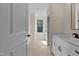 Bathroom with vanity and access to bedroom at 1300 Broad St # C, Durham, NC 27705
