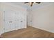 Bedroom with hardwood floors and double closets at 1300 Broad St # C, Durham, NC 27705