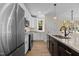 Modern kitchen with stainless steel appliances and granite countertops at 1300 Broad St # C, Durham, NC 27705