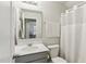 Clean bathroom with single vanity, toilet, and shower at 142 Teagarden Ct, Sanford, NC 27332