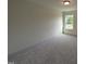 Comfortable bedroom with carpeted flooring, one window, and offers a peaceful retreat for rest and relaxation at 19 Grassland Dr, Garner, NC 27529