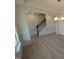 Dining room showcasing stylish trim, light fixture, and access to the staircase at 19 Grassland Dr, Garner, NC 27529