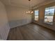 Dining room features stylish floors, recessed lighting, and large windows at 19 Grassland Dr, Garner, NC 27529
