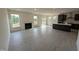 Open-concept living room features hardwood floors, fireplace, and lots of natural light at 19 Grassland Dr, Garner, NC 27529