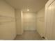 A clean, walk-in closet with carpet and wire shelving provides ample storage space at 19 Grassland Dr, Garner, NC 27529