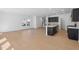 Open concept kitchen with dark cabinets, island, and stainless steel appliances at 2000 Regal Dr # 88, Durham, NC 27703