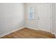 Bright foyer with wood-look floors and neutral walls at 2006 Regal Dr # 85, Durham, NC 27703