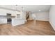 Modern kitchen with white cabinets, an island, and stainless steel appliances at 2006 Regal Dr # 85, Durham, NC 27703