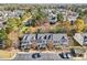 Aerial view of townhouses in a residential neighborhood at 207 Hampshire Downs Dr, Morrisville, NC 27560