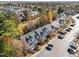 Aerial view of townhouses and surrounding neighborhood at 207 Hampshire Downs Dr, Morrisville, NC 27560
