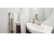 Clean bathroom with single vanity and large mirror at 207 Hampshire Downs Dr, Morrisville, NC 27560