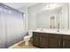 Bathroom with double vanity and shower/tub combo at 207 Hampshire Downs Dr, Morrisville, NC 27560