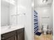 Clean bathroom with single vanity and shower at 207 Hampshire Downs Dr, Morrisville, NC 27560
