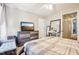 Comfortable bedroom with a dresser and a window seat at 207 Hampshire Downs Dr, Morrisville, NC 27560