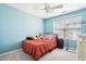 Bedroom with ceiling fan and a full-size bed at 207 Hampshire Downs Dr, Morrisville, NC 27560