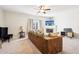 Spacious living room with a fireplace and comfy sectional sofa at 207 Hampshire Downs Dr, Morrisville, NC 27560